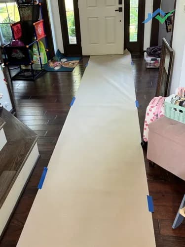 Site-prep floor protection laid through the home before work began on this Purcellville, VA guest bathroom.